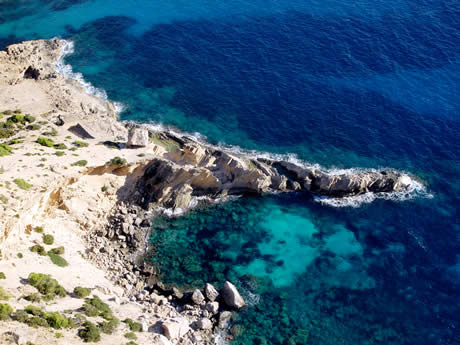 Beach of atlantis in ibiza photo