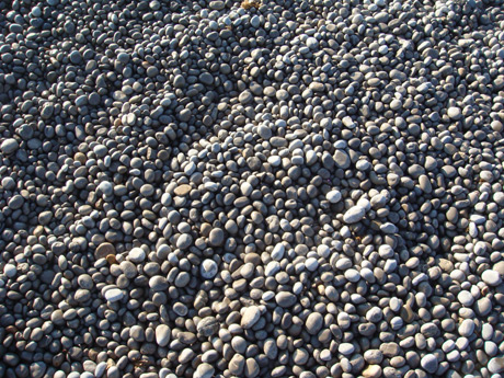 Gravel beach ibiza photo